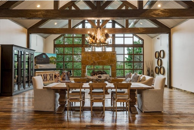 dining area with beamed ceiling, hardwood / wood-style flooring, high vaulted ceiling, and a notable chandelier