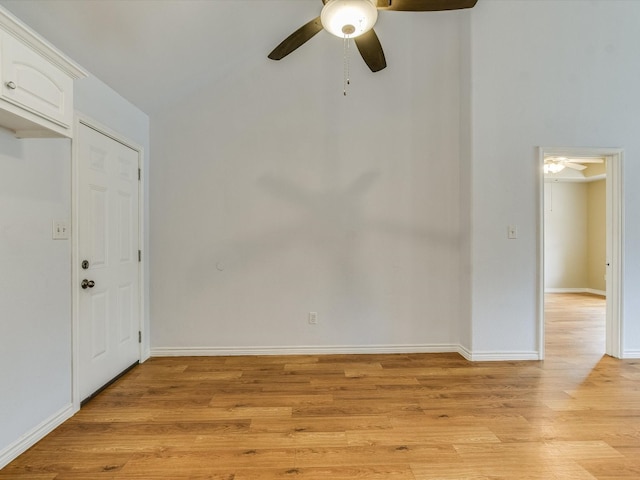 spare room featuring light hardwood / wood-style floors and ceiling fan