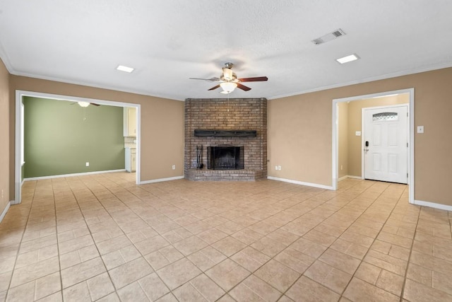 unfurnished living room with ceiling fan, ornamental molding, a fireplace, and a textured ceiling