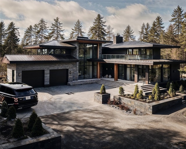 prairie-style house featuring a garage