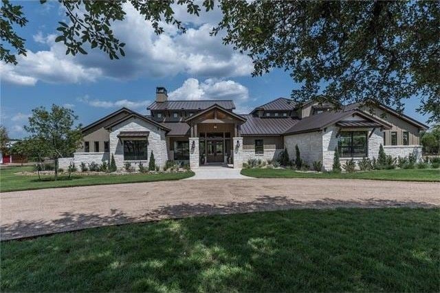 craftsman-style home with a front lawn