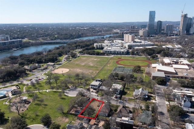 bird's eye view with a water view