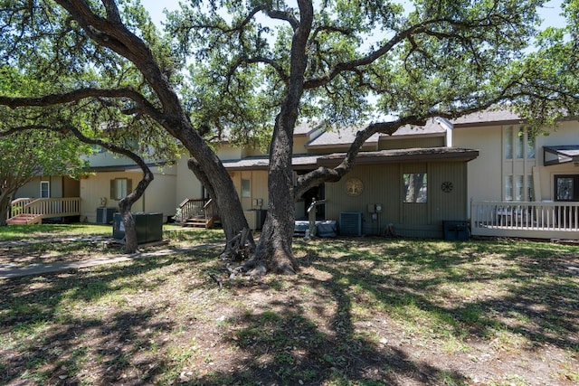 269 Venture Blvd S, Leander, TX 78645 - back of house with a deck and central AC