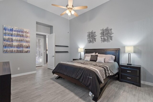 bedroom featuring ceiling fan and hardwood / wood-style floors