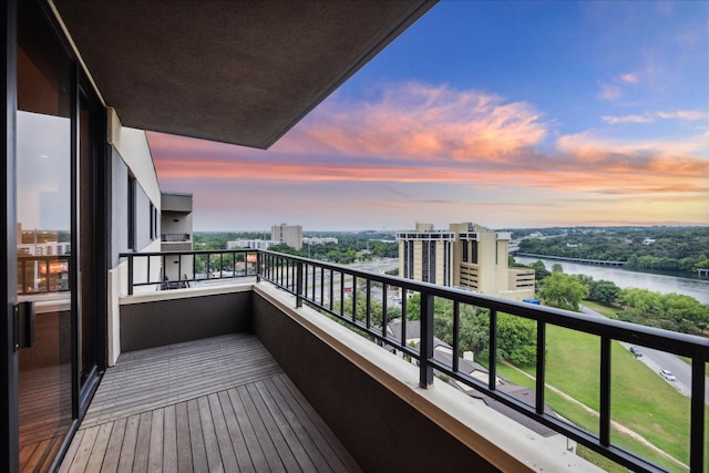 balcony at dusk with a water view