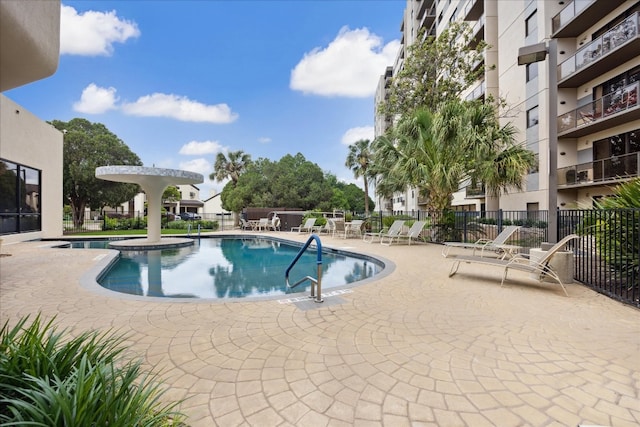 view of swimming pool featuring a patio