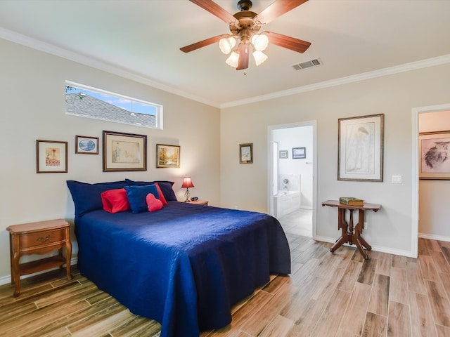 bedroom featuring ceiling fan, light hardwood / wood-style flooring, ensuite bath, and crown molding