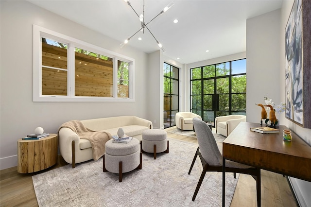 interior space with light wood-style floors and recessed lighting