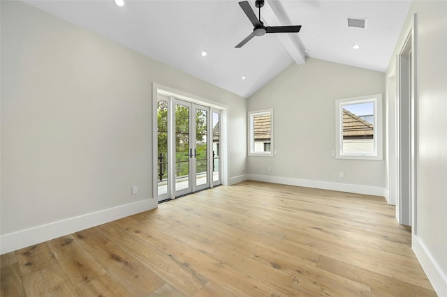 spare room with light wood-type flooring, ceiling fan, french doors, and lofted ceiling with beams