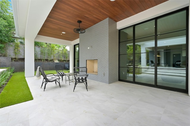 view of patio / terrace with ceiling fan