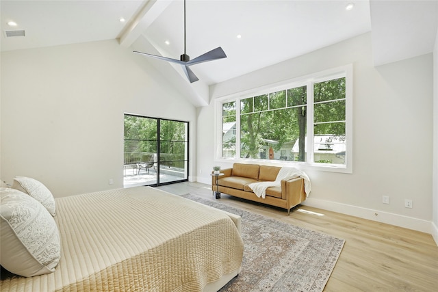 bedroom with ceiling fan, access to exterior, light hardwood / wood-style floors, beam ceiling, and high vaulted ceiling