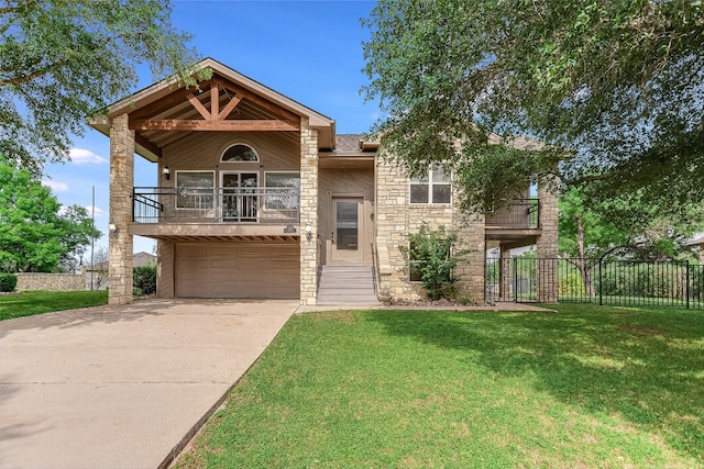 view of front of home with a front yard and a garage