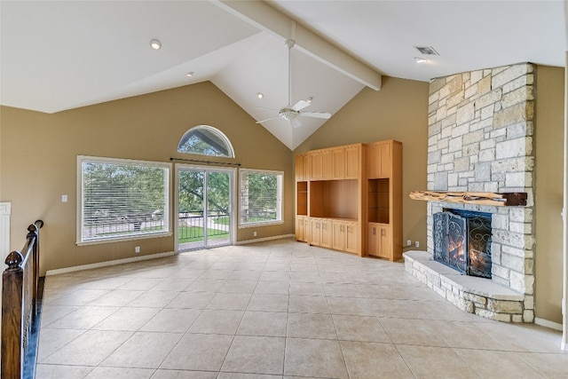 unfurnished living room featuring ceiling fan, a stone fireplace, light tile floors, high vaulted ceiling, and beam ceiling