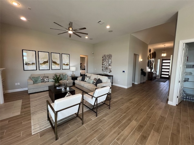 living room with ceiling fan and hardwood / wood-style flooring