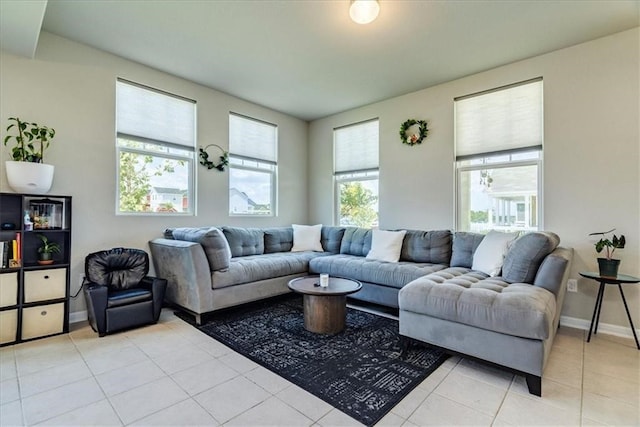 living room featuring light tile floors