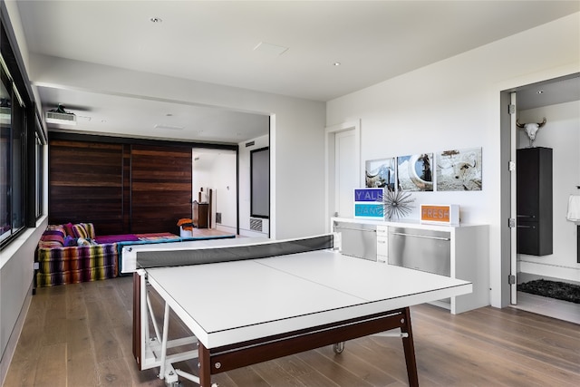 game room featuring hardwood / wood-style floors