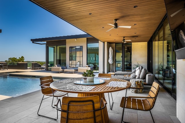 view of patio / terrace featuring outdoor lounge area and ceiling fan