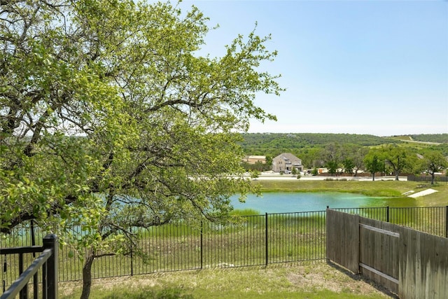 view of water feature featuring fence