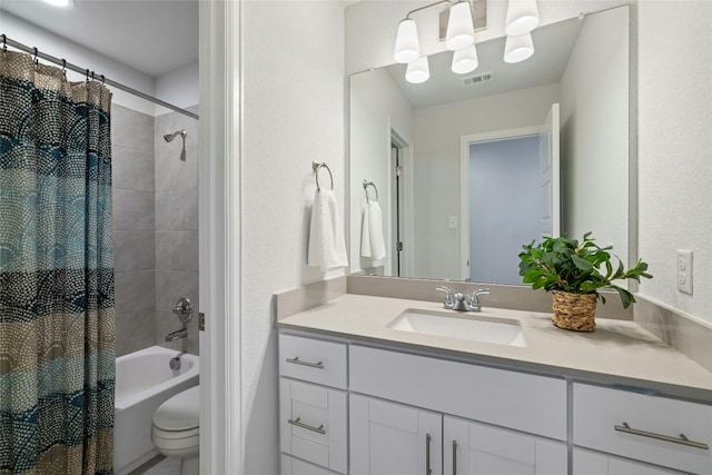 full bath with shower / bathtub combination with curtain, visible vents, vanity, and toilet