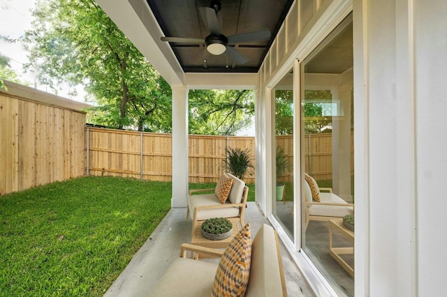 exterior space with ceiling fan