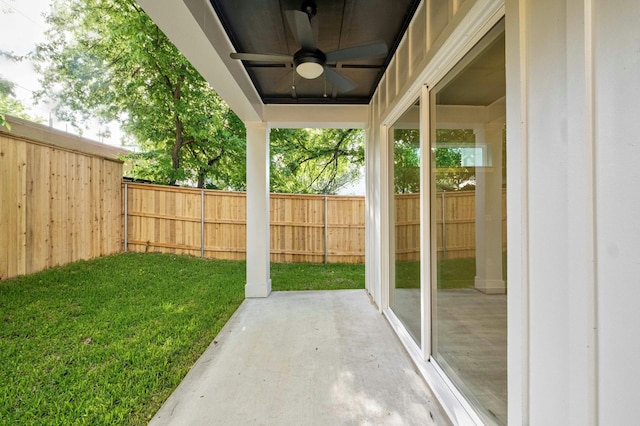 view of patio / terrace featuring ceiling fan