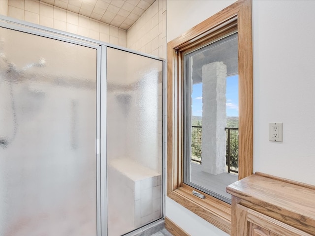 bathroom featuring an enclosed shower