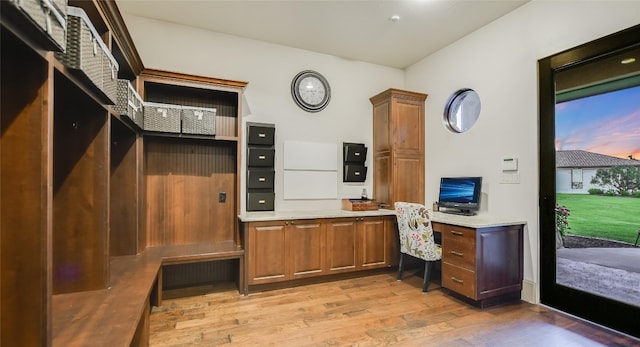 office with light hardwood / wood-style floors