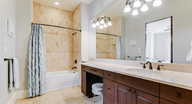 bathroom featuring shower / bathtub combination with curtain, vanity with extensive cabinet space, and tile floors