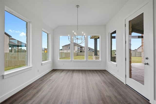 unfurnished sunroom with an inviting chandelier