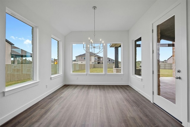 509 Sierra Lisa Cv, Liberty Hill, TX 78642 - unfurnished sunroom featuring wood finished floors, a chandelier, and vaulted ceiling