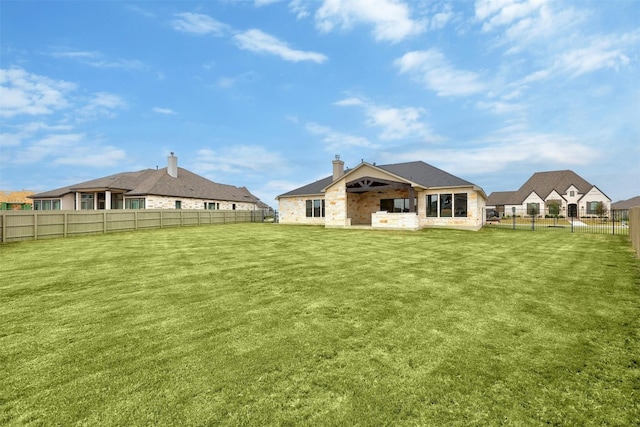 509 Sierra Lisa Cv, Liberty Hill, TX 78642 - rear view of property with a fenced backyard, a ceiling fan, and a patio area