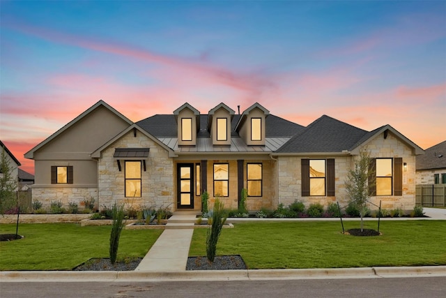 509 Sierra Lisa Cv, Liberty Hill, TX 78642 - view of front of home featuring stone siding, a standing seam roof, a metal roof, roof with shingles, and covered porch