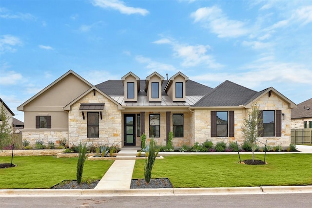 509 Sierra Lisa Cv, Liberty Hill, TX 78642 - view of front of home featuring stone siding, a standing seam roof, a metal roof, and roof with shingles