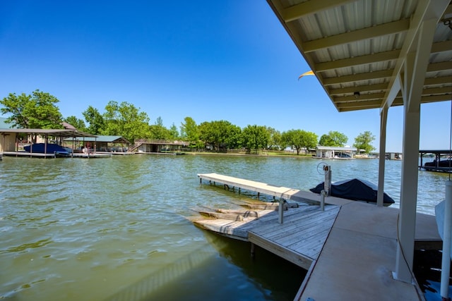 view of dock with a water view