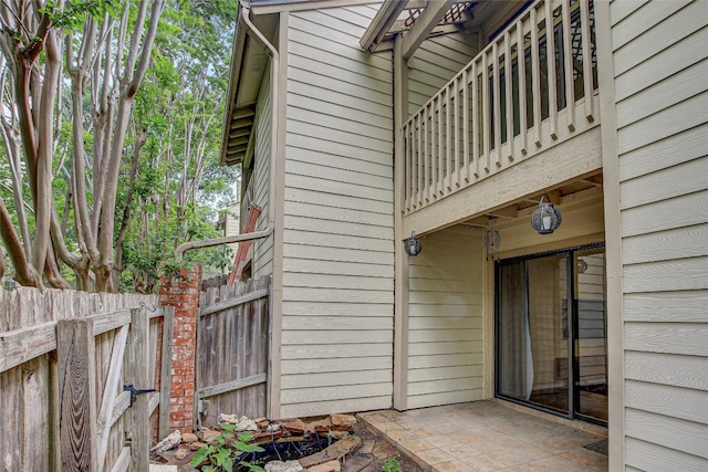 view of property exterior with a balcony