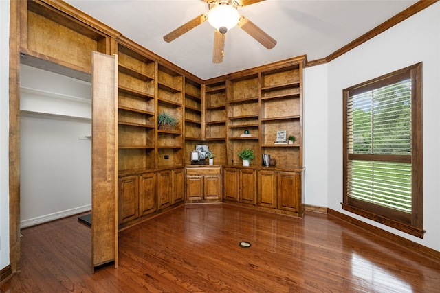 unfurnished office featuring dark hardwood / wood-style floors, ceiling fan, and ornamental molding