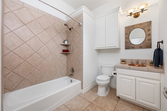 full bathroom featuring tile floors, tiled shower / bath, vanity, and toilet