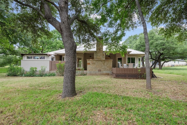 view of front of home with a front lawn