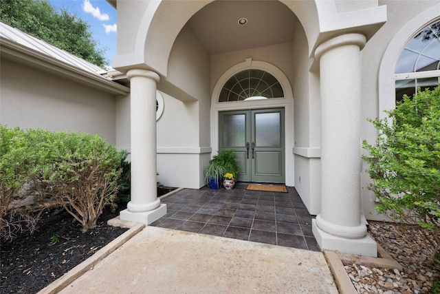 doorway to property featuring french doors