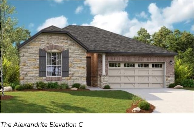 view of front of property featuring a garage and a front yard