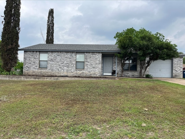 ranch-style house with a garage and a front yard