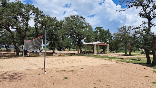 surrounding community featuring volleyball court and a gazebo