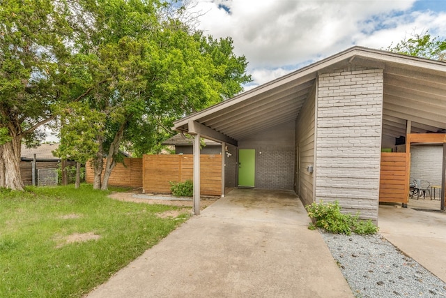 exterior space featuring a front lawn