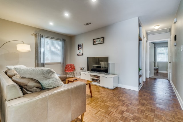 living room with parquet flooring