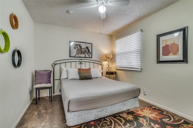 bedroom with a textured ceiling and ceiling fan