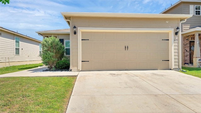 garage featuring a yard