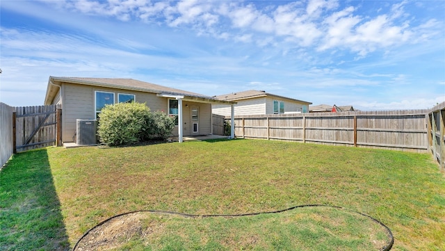 view of yard with central AC