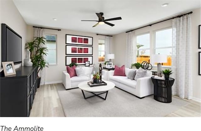 living room with light hardwood / wood-style flooring and ceiling fan