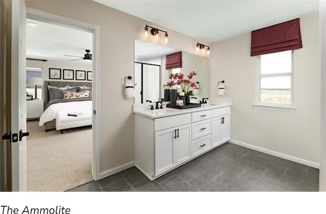 bathroom featuring dual bowl vanity and ceiling fan