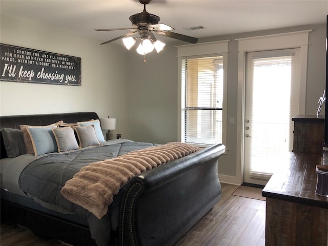 bedroom featuring wood-type flooring and ceiling fan